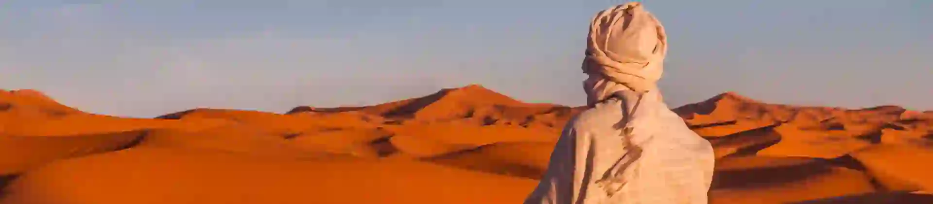 Berber stopping for prayer in the Sahara