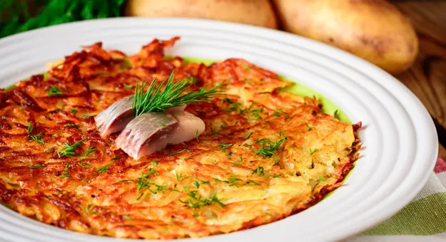 Traditional Swiss Potato Rosti With Dill And Salted Herring