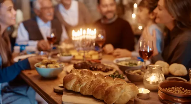 People enjoying Challah Bread, Israel