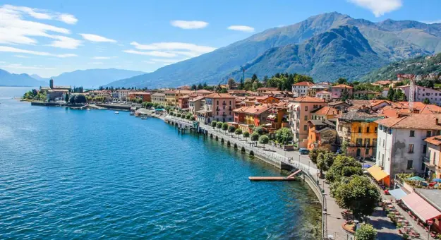 View of Como Town and its' waterfront, with mountains in the distance 