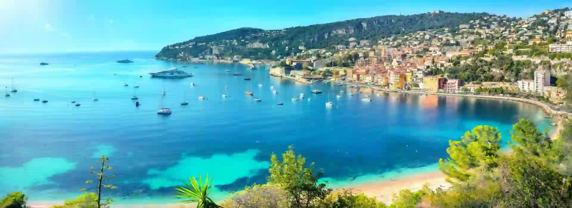 View of the Italian Riviera, showing the bright blue sea and the edge of the land