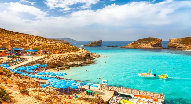 Turquoise lagoon with beach near the Comino island between the islands of Malta