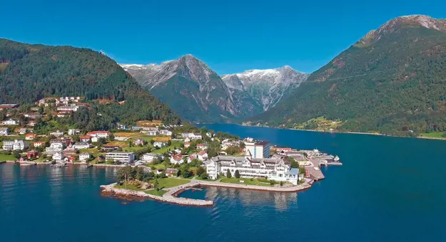 Town amongst the fjords of Norway and its mountains