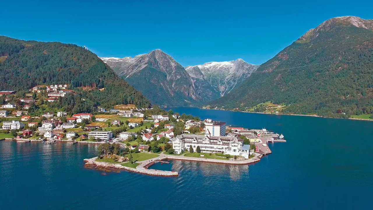 Town amongst the fjords of Norway and its mountains