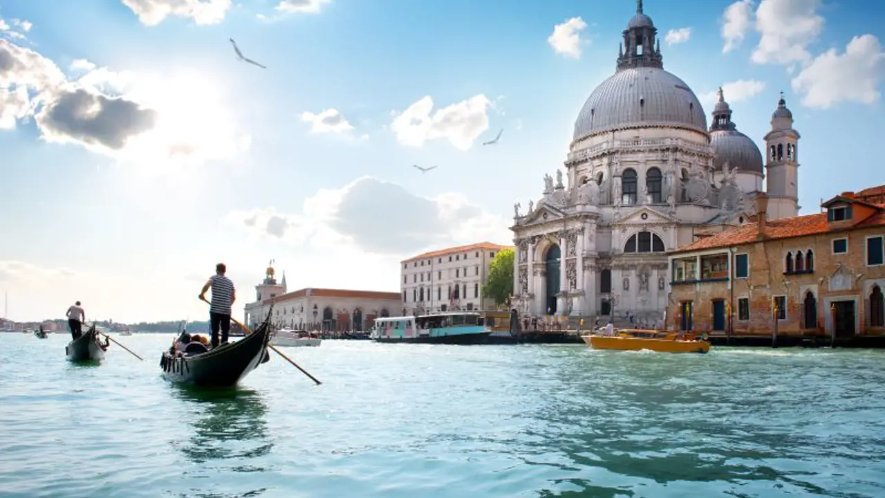 Gondola On Grand Canal Venice with view of the Salute Church