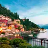 Buildings of Lake Como and the body of water at sunset