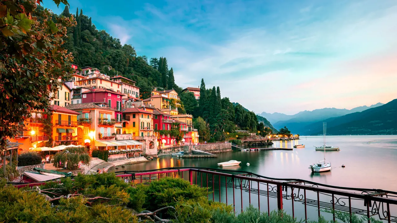 Buildings of Lake Como and the body of water at sunset