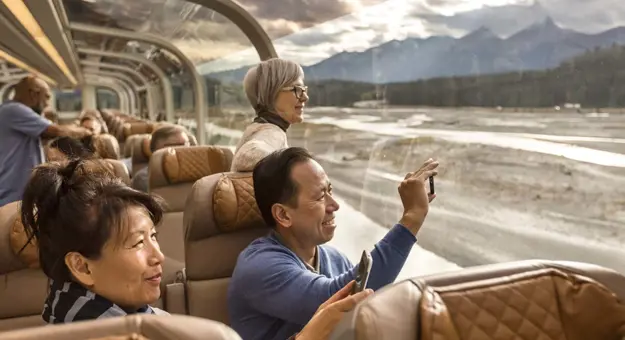 Couple Taking Photo On Rocky Mountaineer