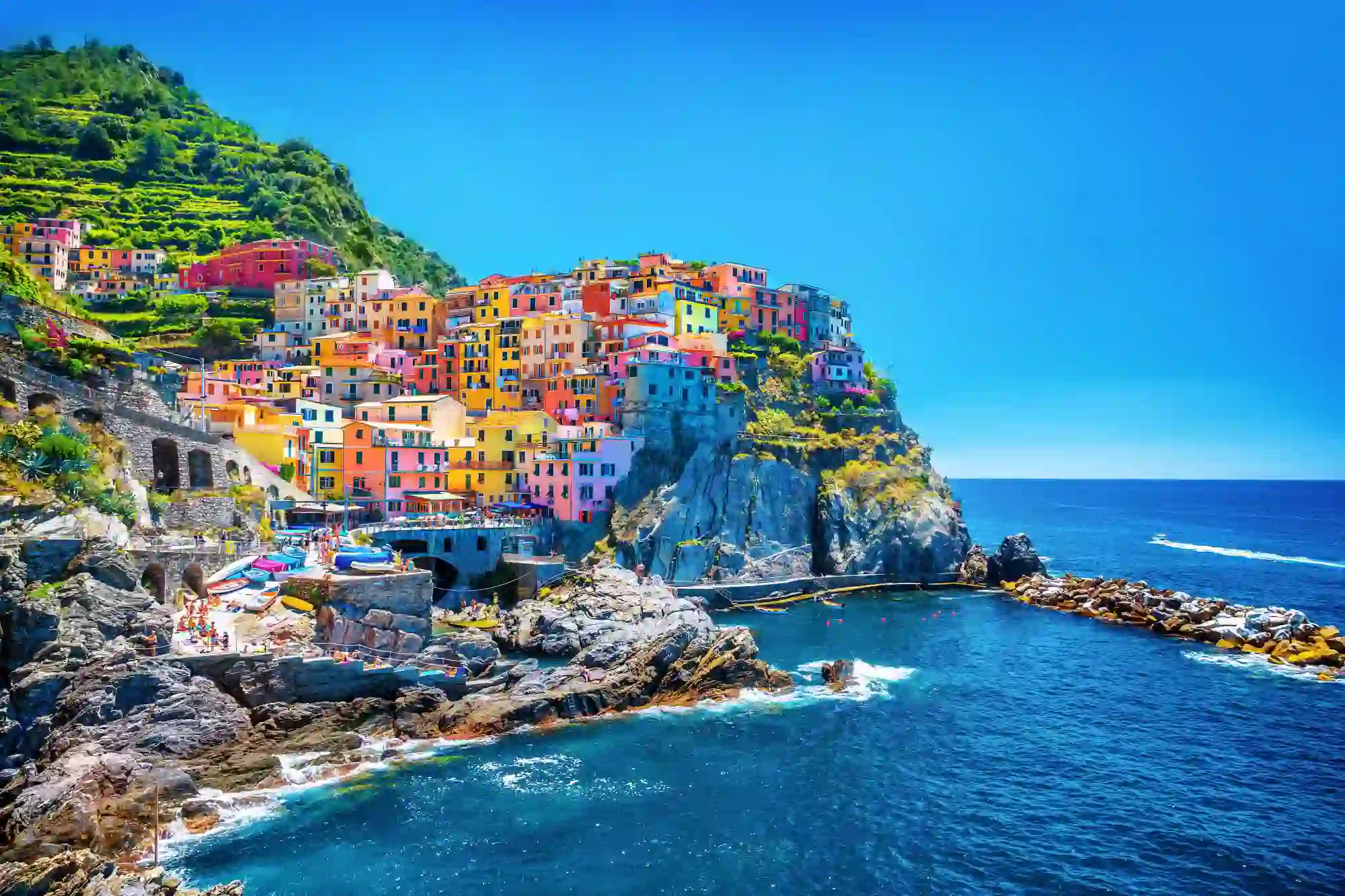 The colourful town of Cinque Terre on a cliff overlooking the sea