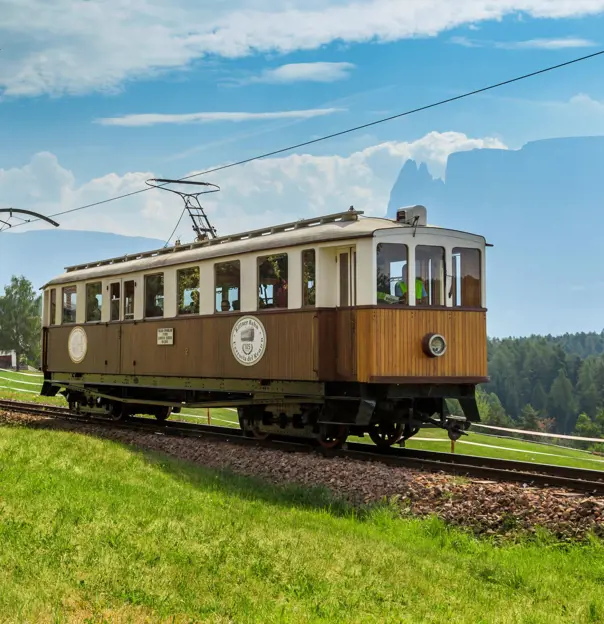 Train moving along the Renon Railway