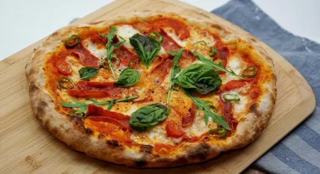 Margherita Pizza On Table In Naples