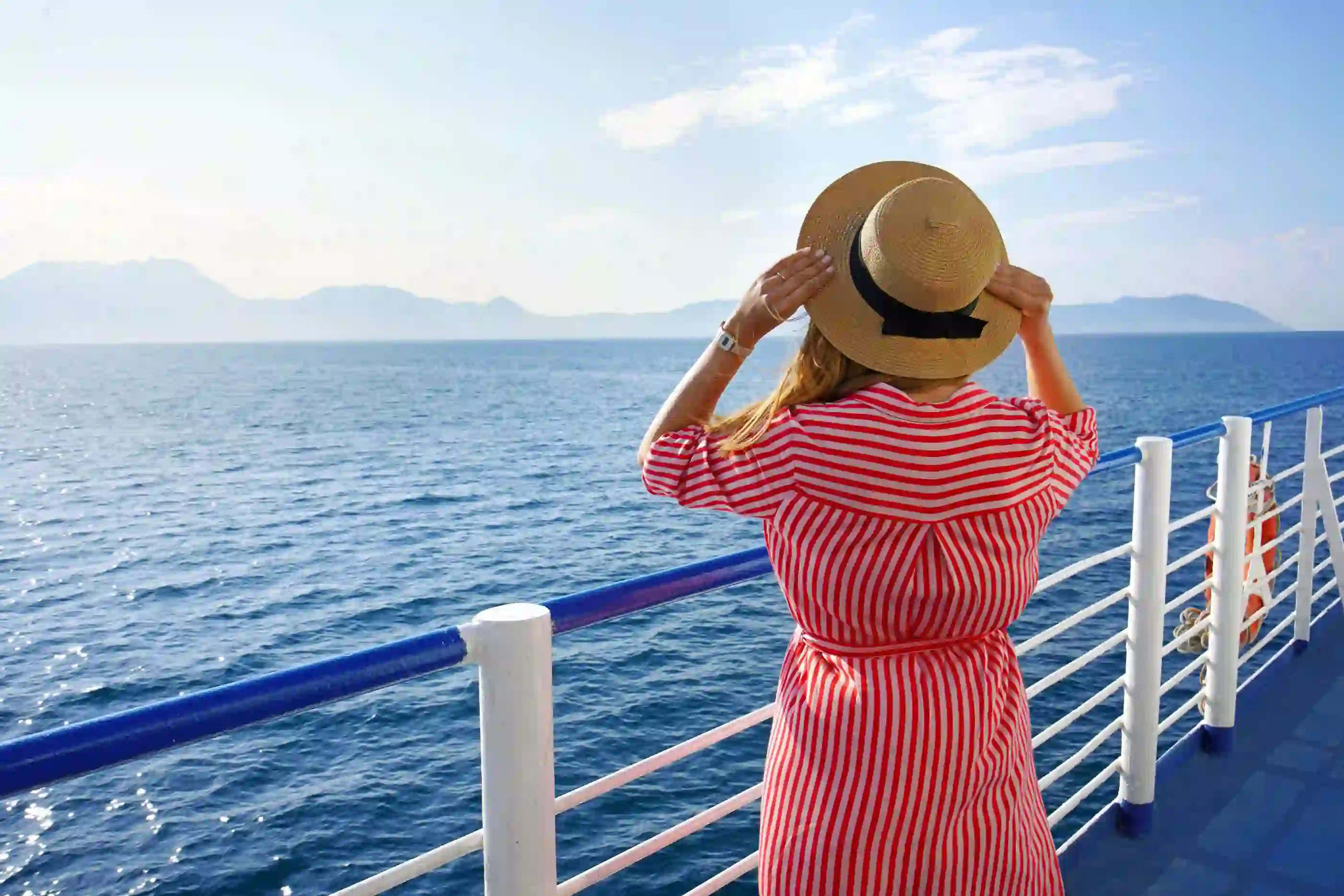 Woman Looking Out From Cruise Ship