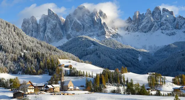 Dolomites in the snow in St Magdalena, Italy