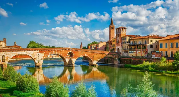 Ponte Pietra bridge and Verona's waterfront buildings