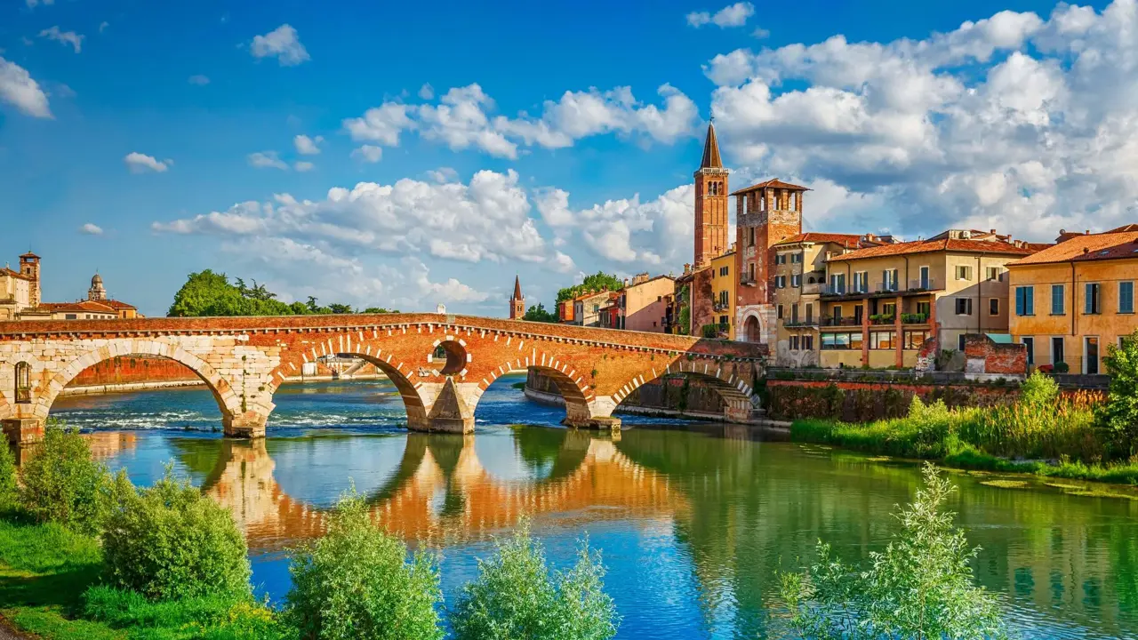 Ponte Pietra bridge and Verona's waterfront buildings