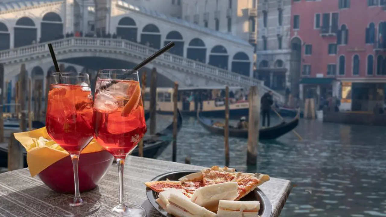 Food And Drink with a view of Rialto Bridge and the canal