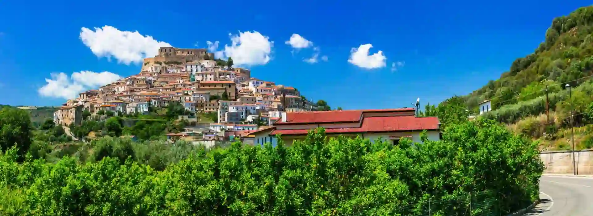 View of Rocca Imperiale in Cosenza Province, Southern Italy, showing the houses that cover the mountain and the castle at the top