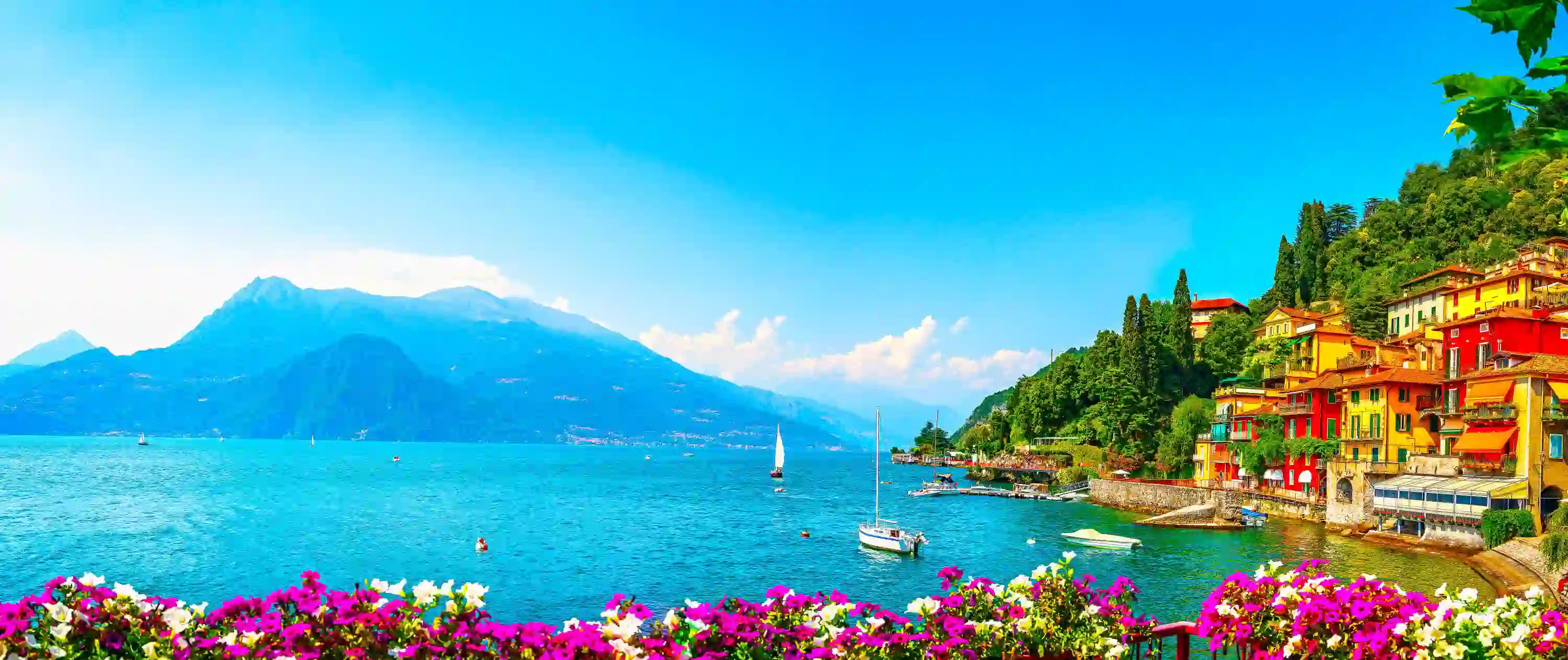 Colourful Houses In Lake Como over looking the sea and mountains