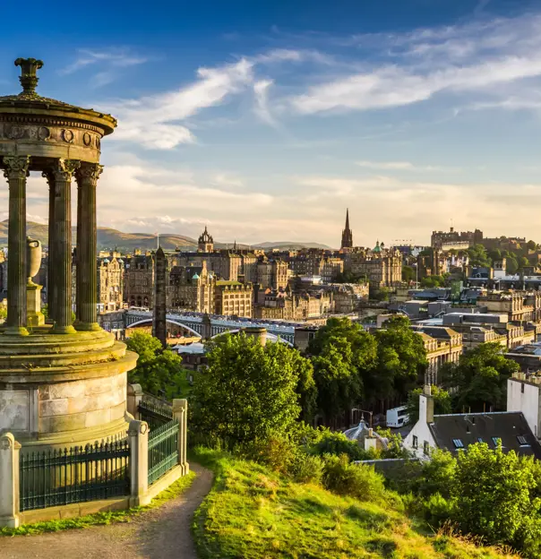 View of Edinburgh city, with the Dugald Stewart Monument in the left forefront