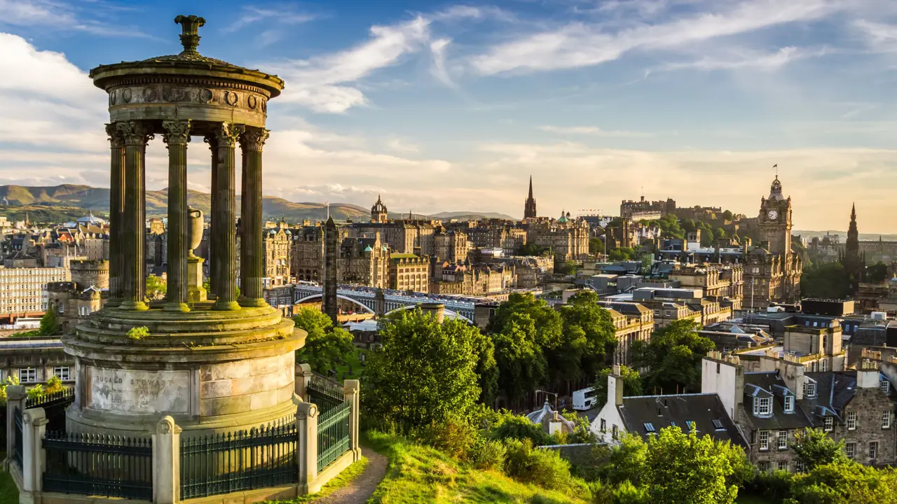 View of Edinburgh city, with the Dugald Stewart Monument in the left forefront