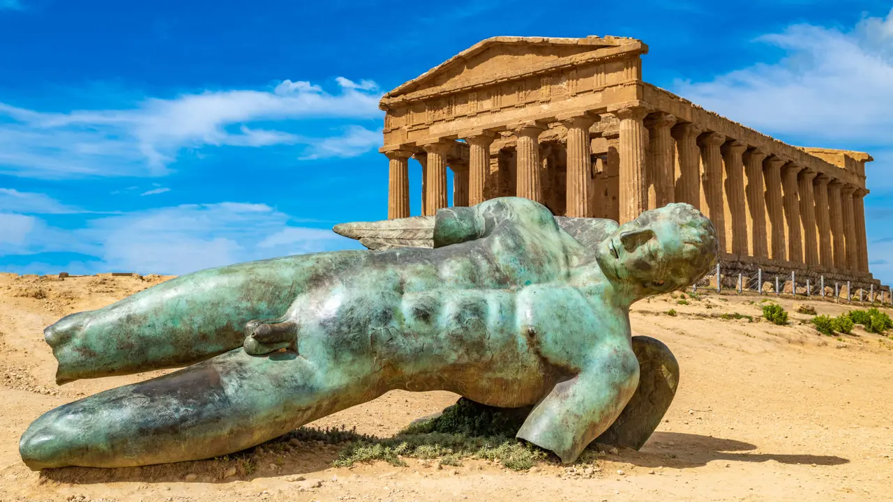 Temple Of Concordia And The Statue Of Fallen Icarus in Sicily