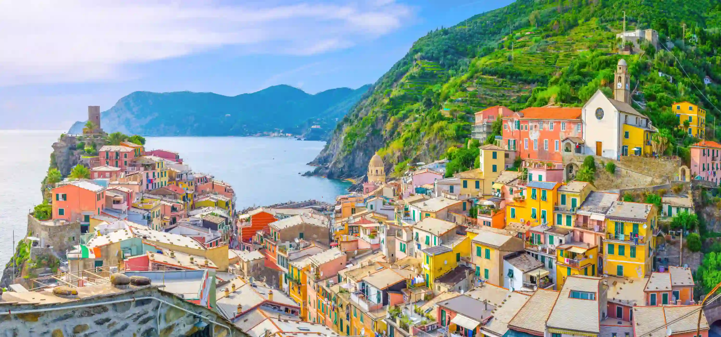 View of Vernazza, the sea, and a mountain in the distance