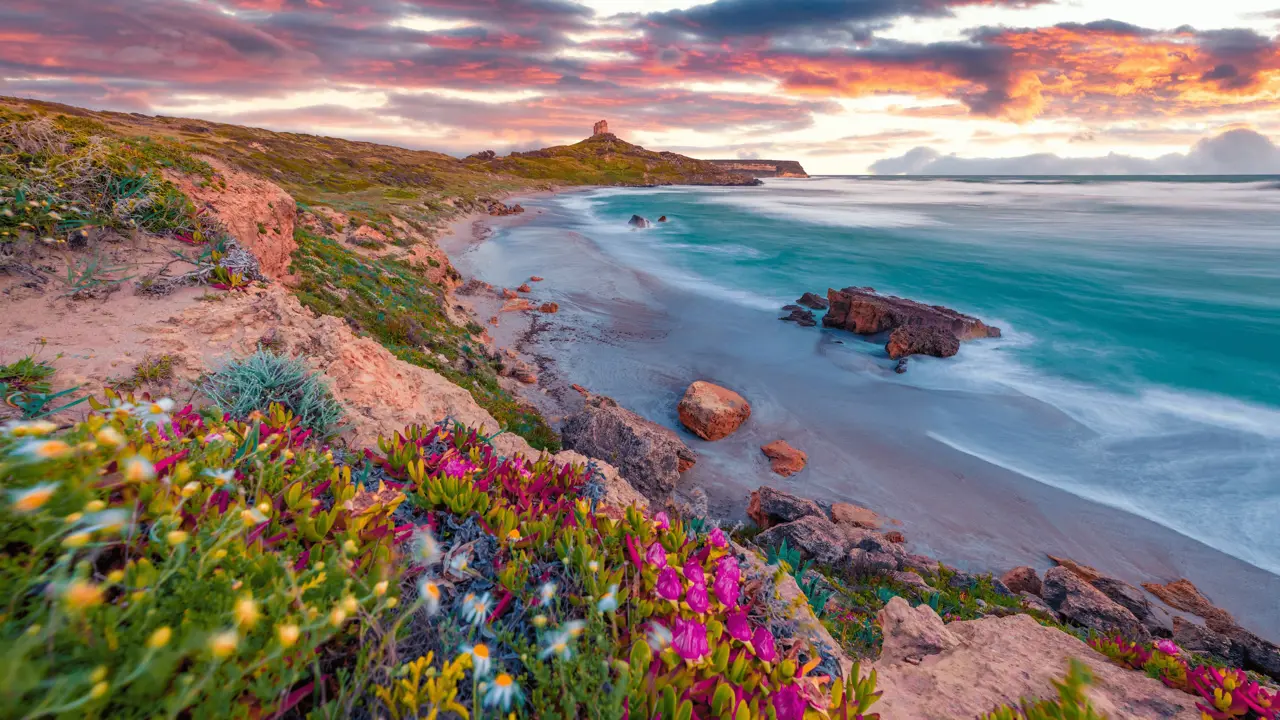 Fantastic sunrise on Capo San Marco Lighthouse on Del Sinis peninsula, Sardinia