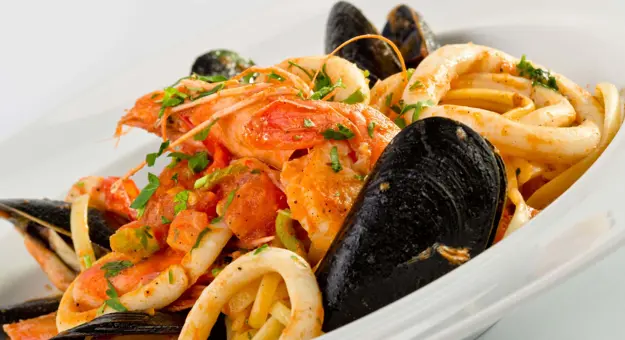 Close up of a dish of seafood linguine